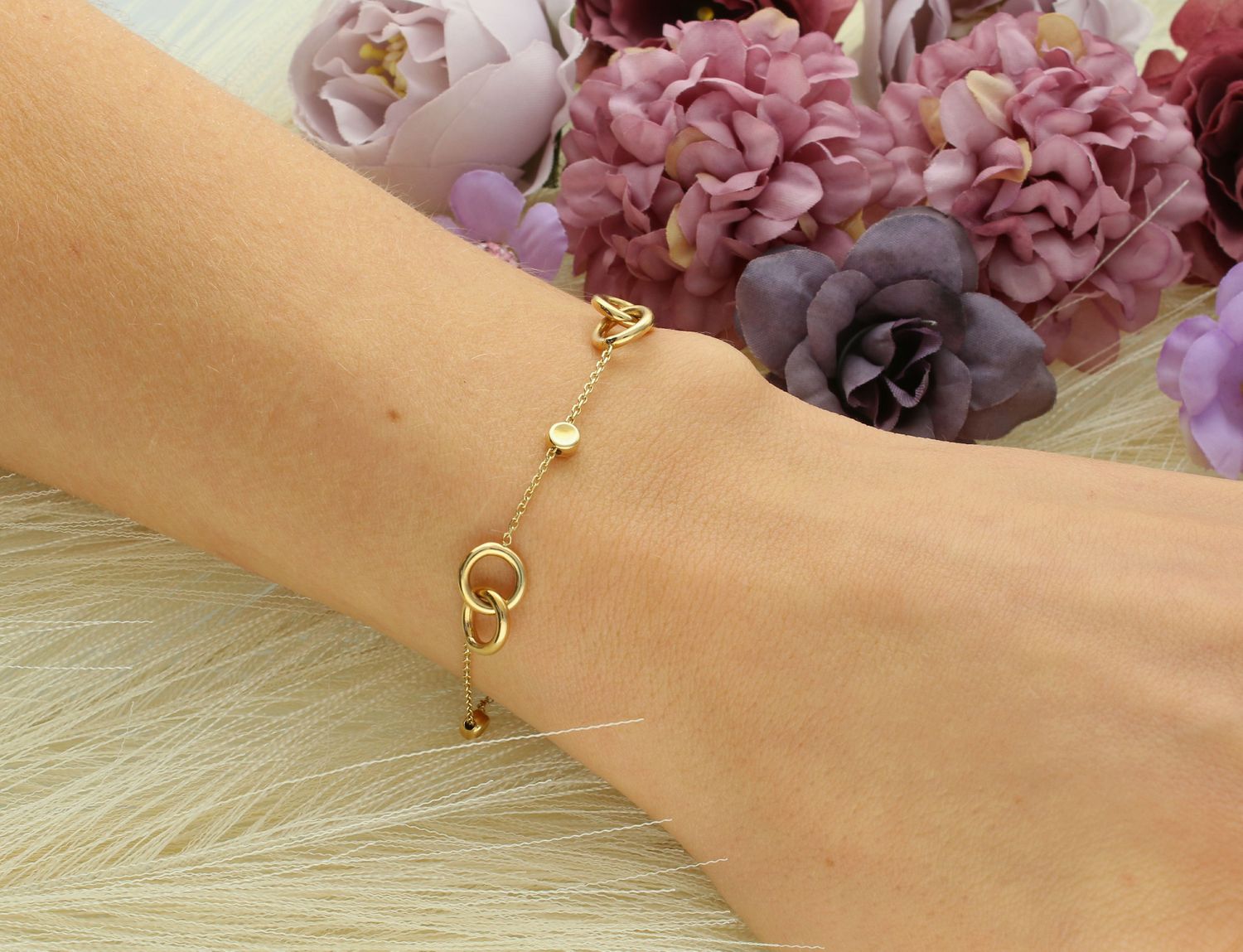 Bransoletka złota kółeczka próba 585, B RE 436 0507 Złota bransoletka wykonana z 14 karatowego żółtego złota. Bransoletka to idealny pomysł na prezent. Złota biżuteria o oryginalnej formie kółeczek. 1.jpg